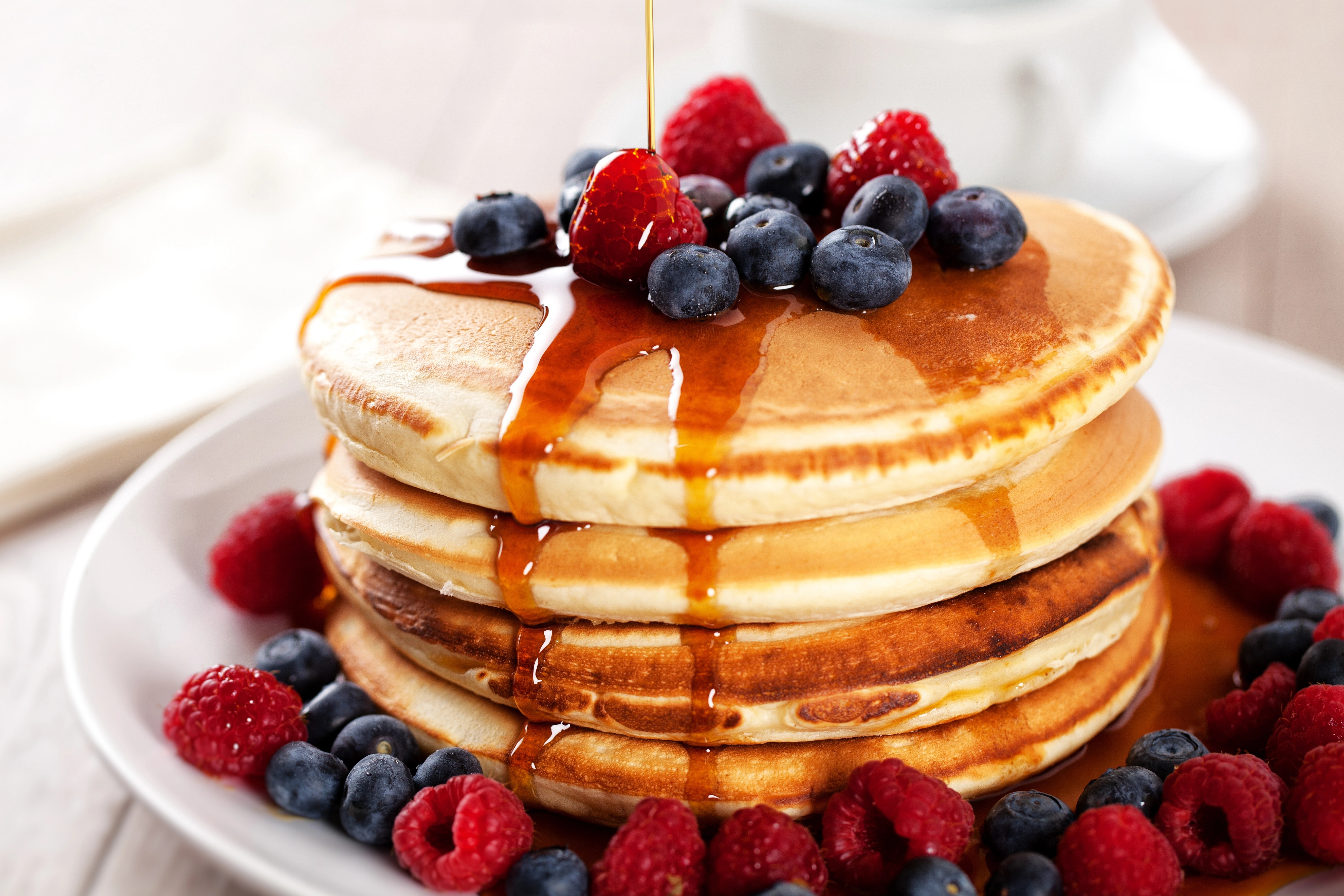 pancakes maple sirup and forest fruit